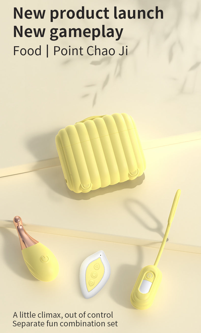 Yellow case with vibrator, remote control on a light background